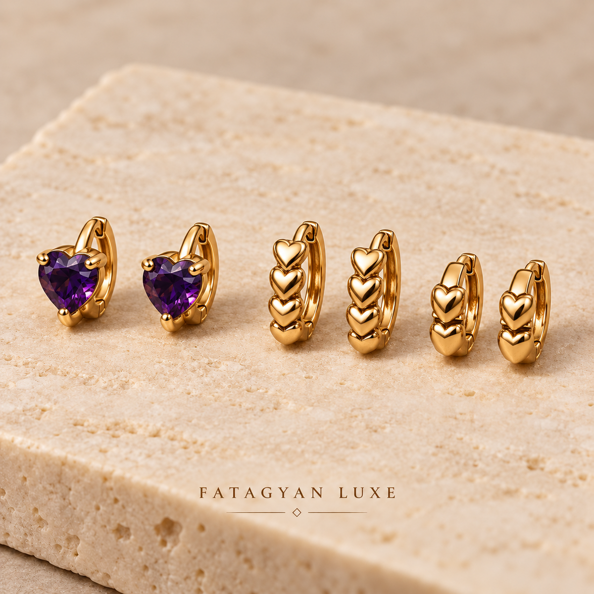 Amethyst Amour Trio Huggie Set with three pairs of gold-tone heart earrings