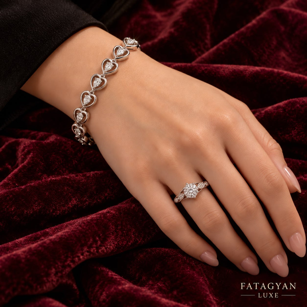 Xuping silver-tone stainless steel heart bracelet and ring set worn on hand