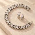 Aveline Radiant silver-tone crystal bracelet and earrings jewellery set on stone