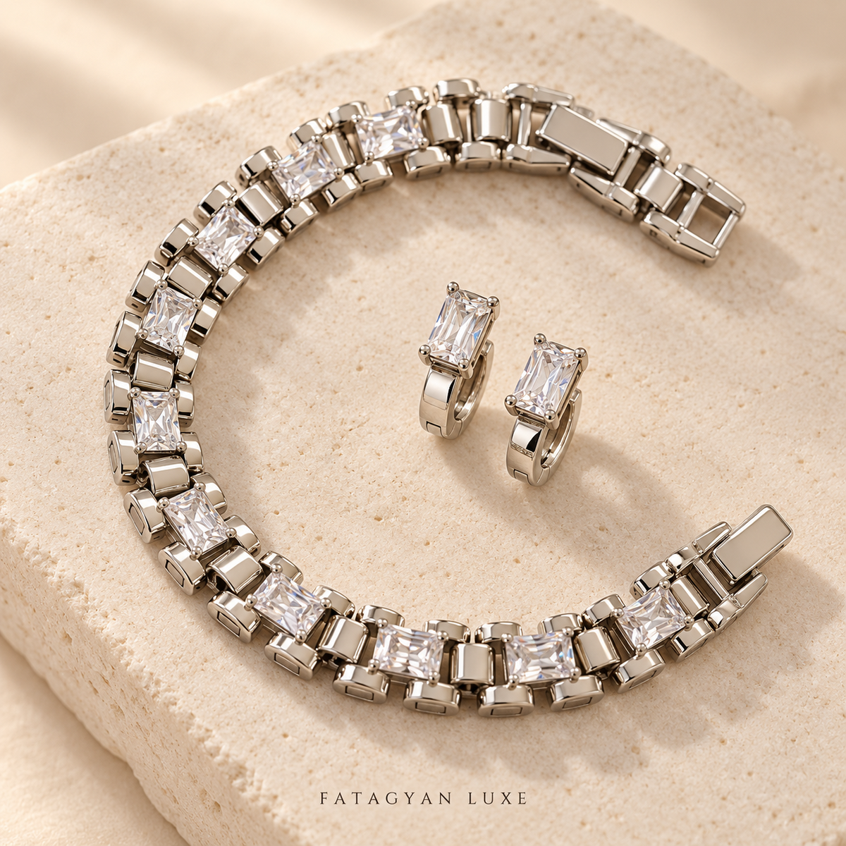 Aveline Radiant silver-tone crystal bracelet and earrings jewellery set on stone