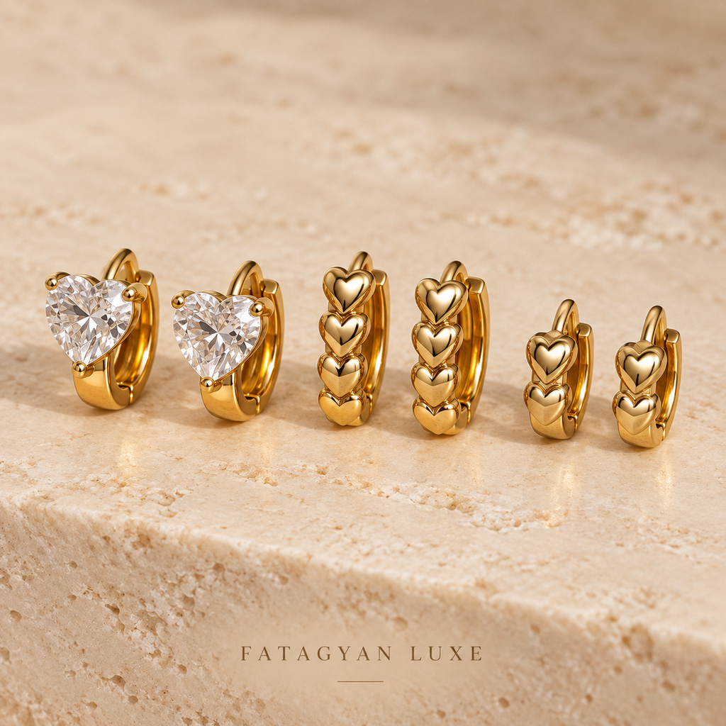 Crystal Amour Trio Huggie Set with three pairs of gold-tone heart earrings
