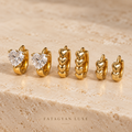 Crystal Amour Trio Huggie Set with three pairs of gold-tone heart earrings