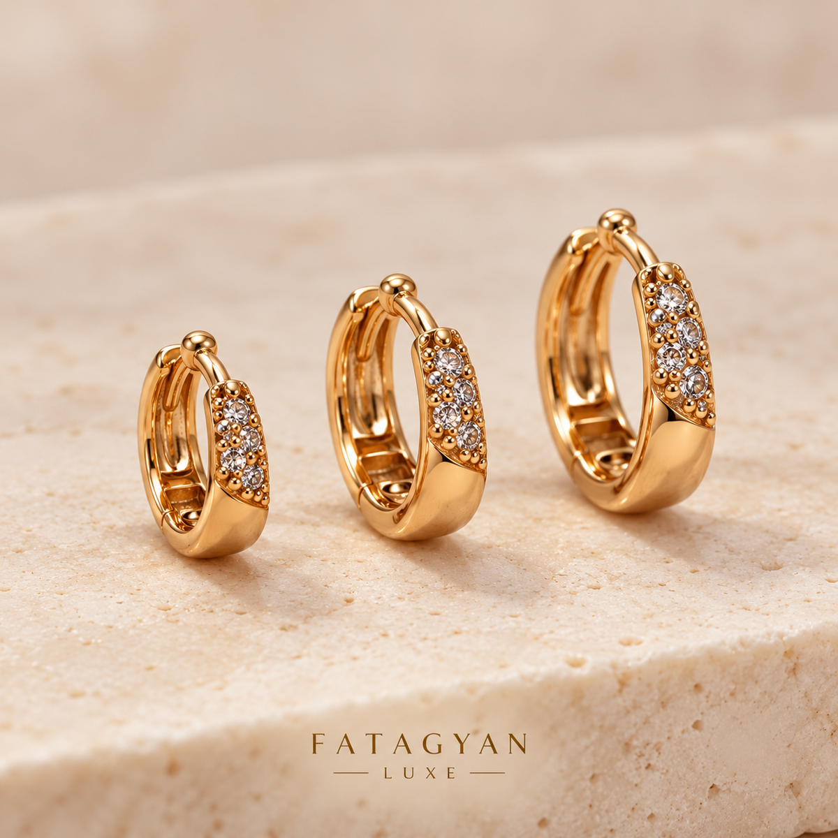 Éclat Trio Pavé Hoop Earring Set with three graduated gold-tone crystal hoops