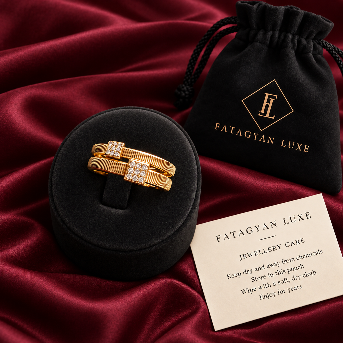Arielle square crystal ring displayed with Fatagyan Luxe pouch and care card