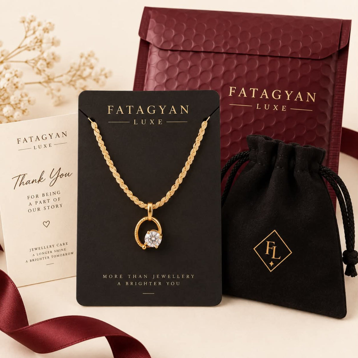 Solène Crystal Orbit Necklace with Fatagyan Luxe packaging
