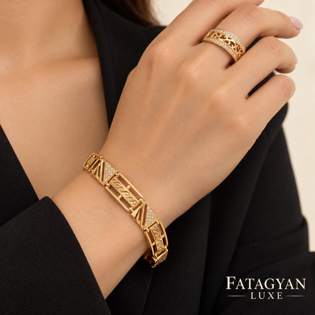 Model wearing Seraphine scroll crystal bracelet and ring set