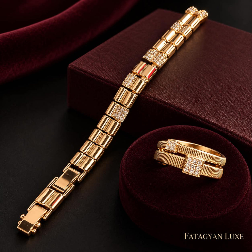 Gold-tone crystal link bracelet and matching double-band ring on burgundy velvet