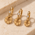 Floréa Trio Flower Drop Earring Set with three gold-tone flower drop earrings in graduated sizes