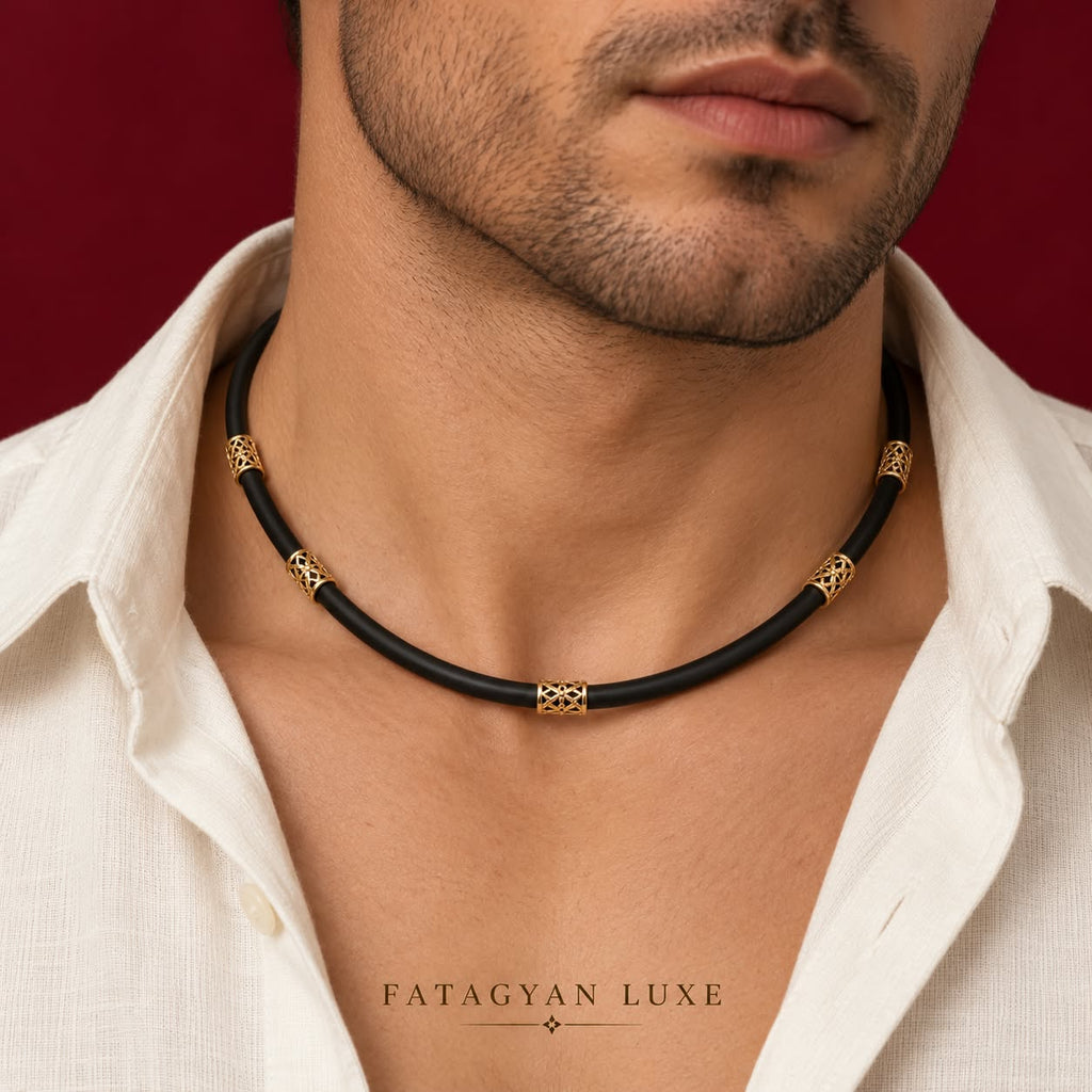Noir Filigree black and gold-plated adjustable necklace worn by man