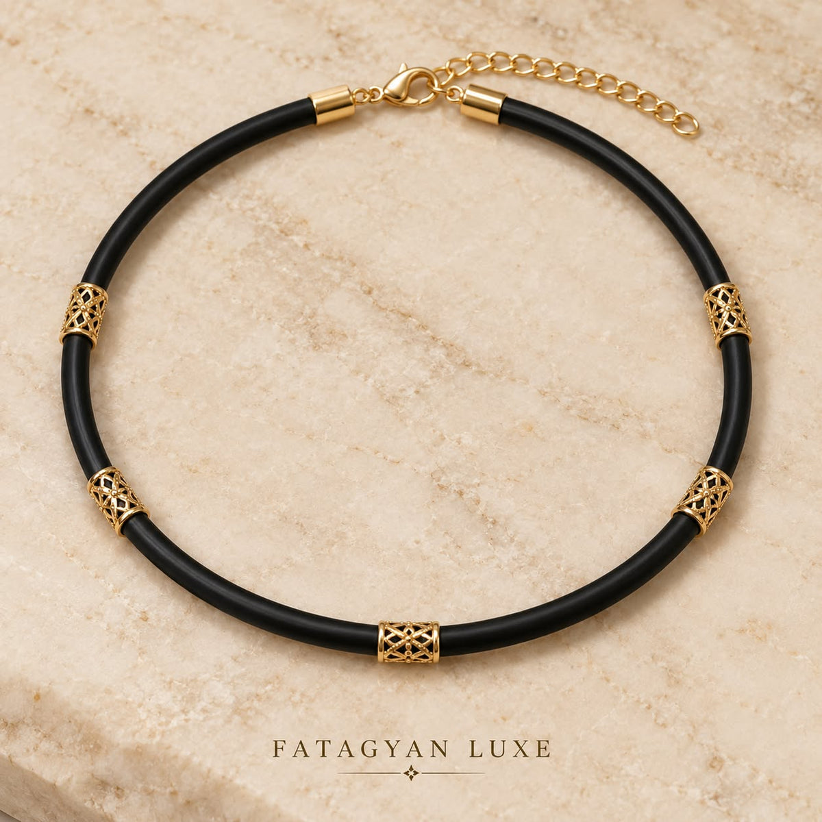 Noir Filigree black cord necklace with 18K gold-plated filigree details on stone