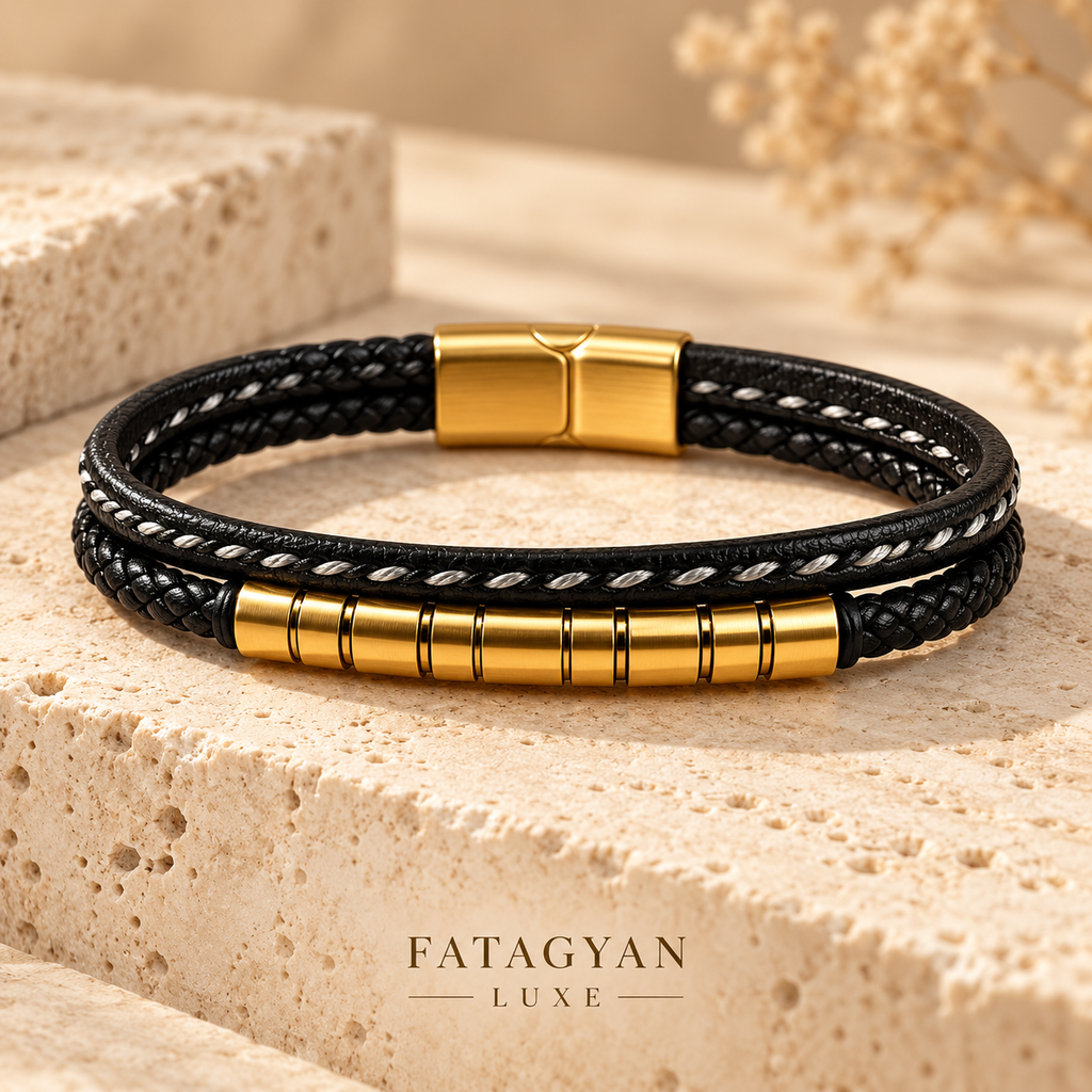 Noir Helix black bracelet with gold-plated segmented centre detail on ivory stone