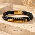 Noir Helix black bracelet with gold-plated segmented centre detail on ivory stone