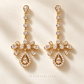 Palais Lumière Chandelier Earrings in gold tone with clear crystal teardrop detailing