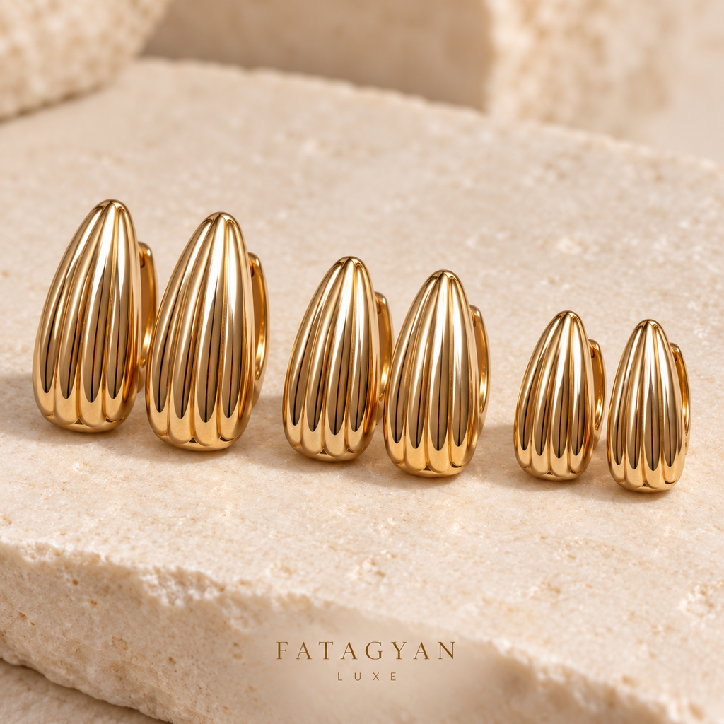 Sculpté Trio Gold Hoop Set with three pairs of graduated sculpted gold-tone hoops