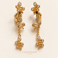 Serpentine Éclat Crystal Drop Earrings in gold tone with clear crystal snake motifs