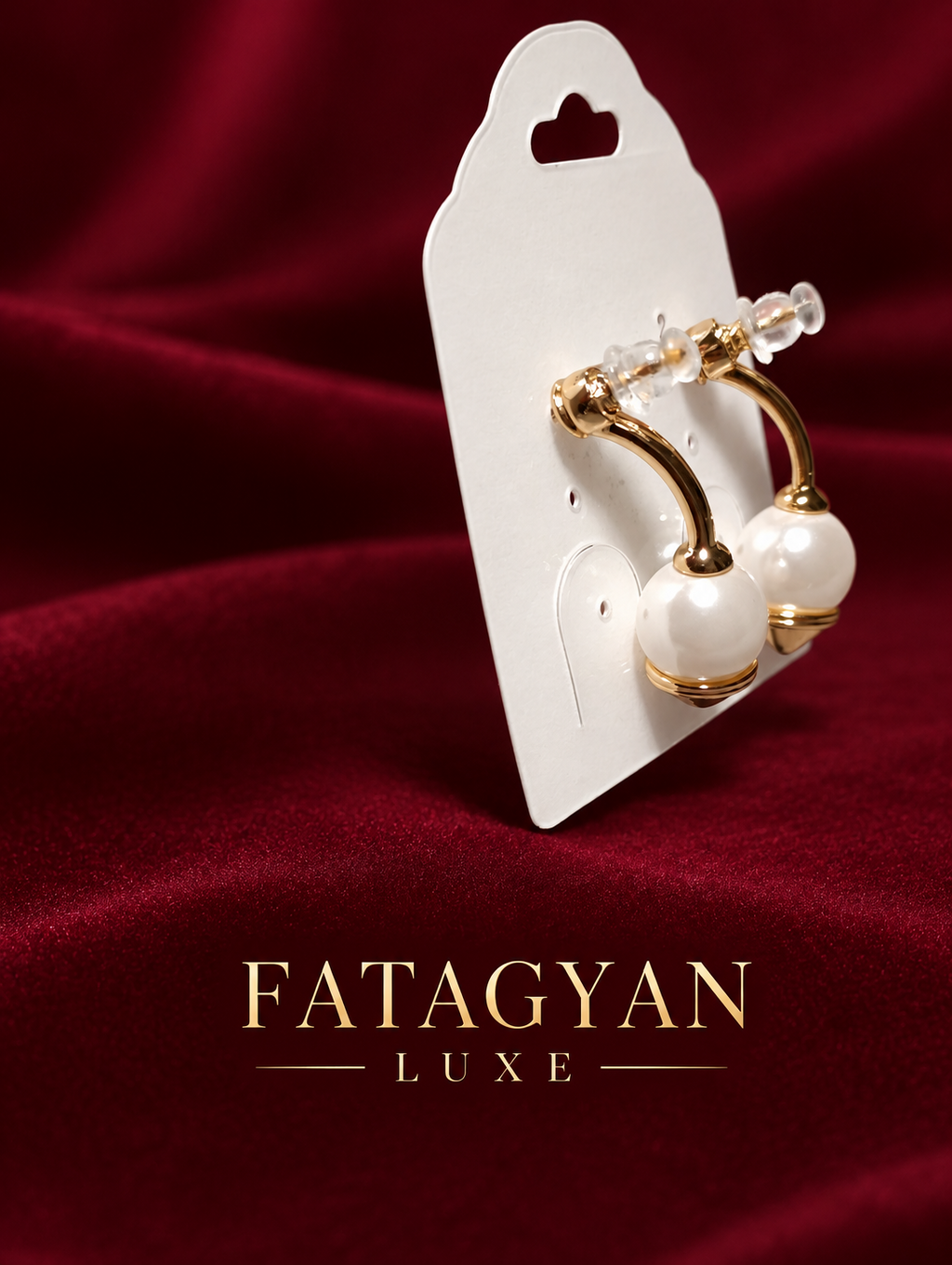 Solène Champagne Pearl Earrings on burgundy Fatagyan Luxe presentation