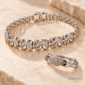 Vela Twist silver-tone crystal bracelet and ring jewellery set on stone